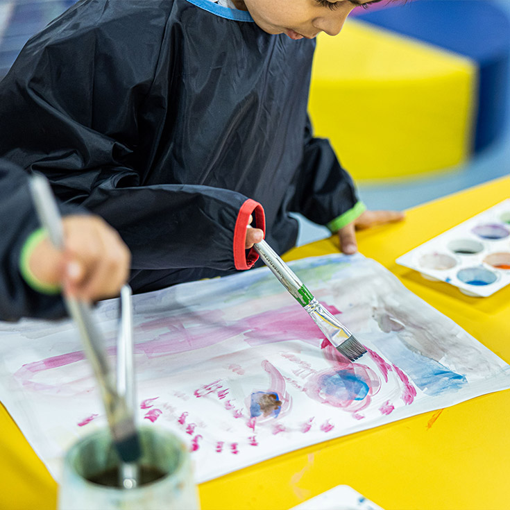 close up shot of Sacred Heart Catholic Primary School Westmead student painting